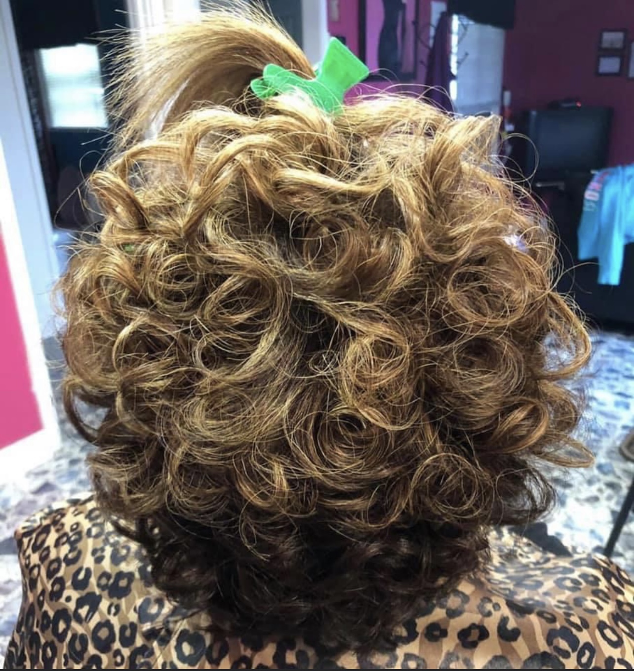 Soft golden curls seen from behind